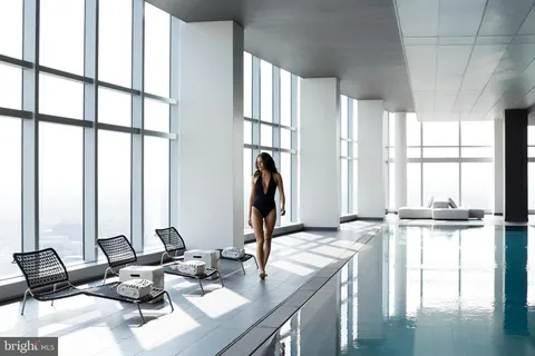 a bathroom with a sink and a window