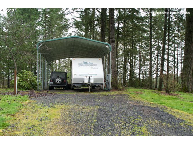 27080 Northwest Olson Road Gaston, OR 97119 - Photo 24 of 32 a view of a house with a backyard