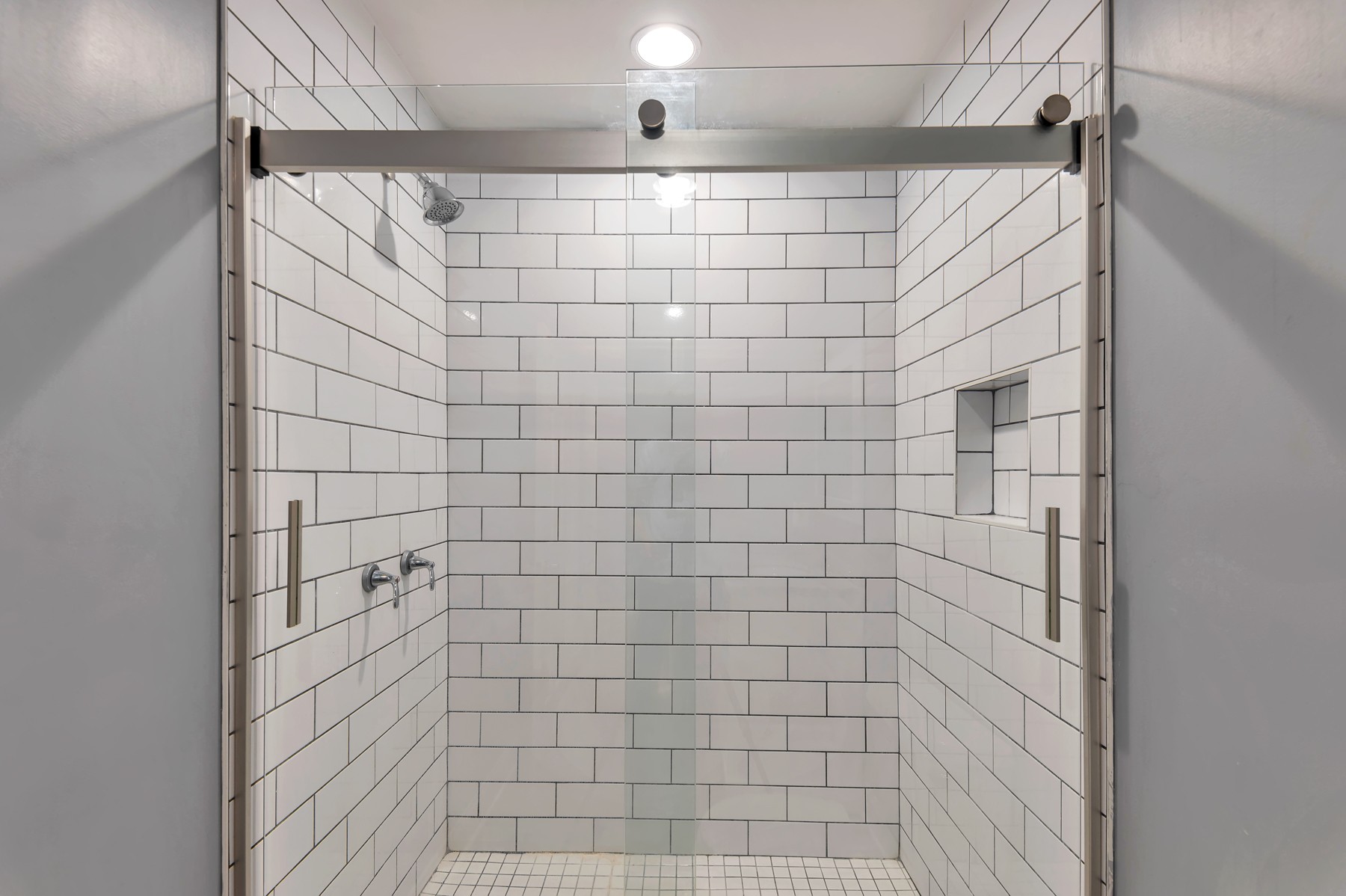 1301 Neelys Bend Road, Unit D27 Madison, TN 37115 - Photo 21 of 26 a bathroom with a shower