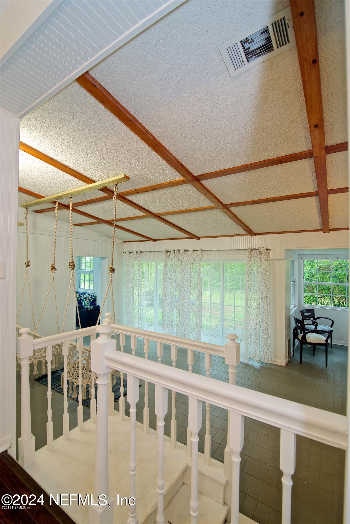 1938 Biggers Road Jacksonville, FL 32216 - Photo 17 of 25 a view of a porch with furniture and a window