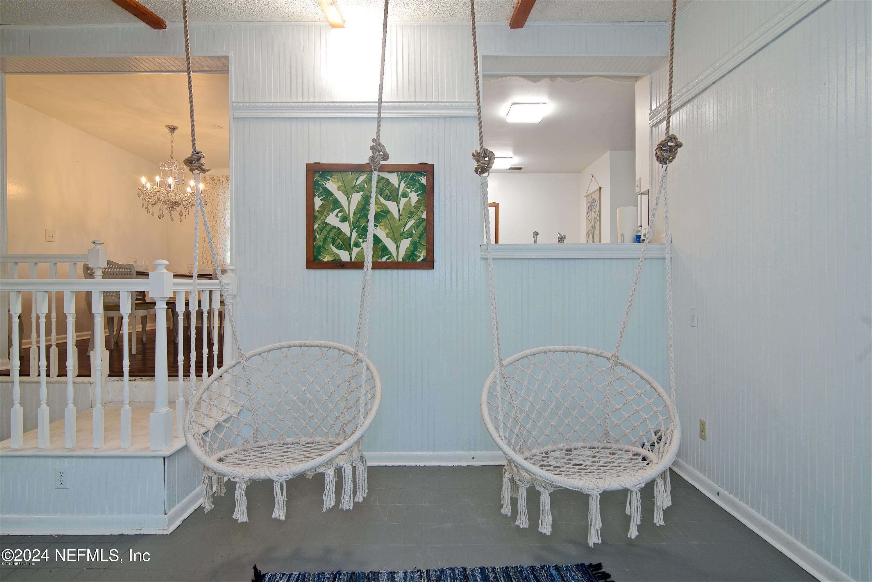 1938 Biggers Road Jacksonville, FL 32216 - Photo 7 of 25 a bathroom with a toilet a sink and mirror