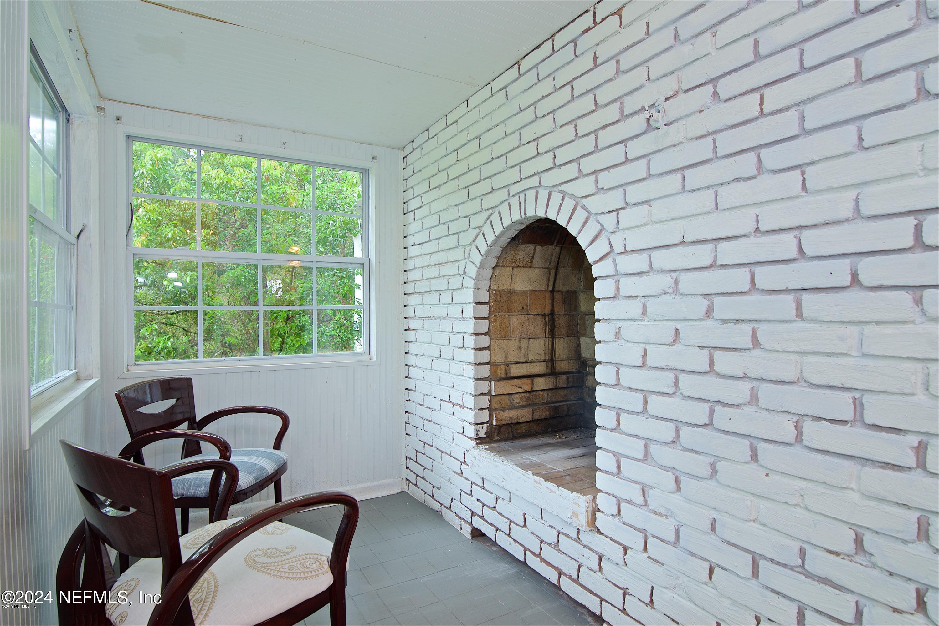 1938 Biggers Road Jacksonville, FL 32216 - Photo 9 of 25 a view of empty room with furniture and window