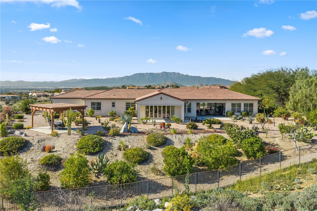 7774 Kingdom Drive Riverside, CA 92506 - Photo 15 of 66 a view of a lake with couches and city view