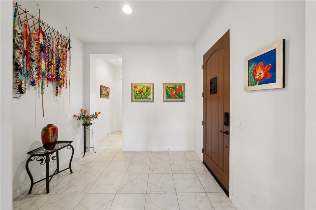 7774 Kingdom Drive Riverside, CA 92506 - Photo 17 of 66 a view of a hallway with workspace