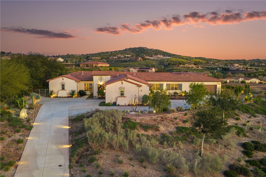7774 Kingdom Drive Riverside, CA 92506 - Photo 2 of 66 a view of a lake with a city