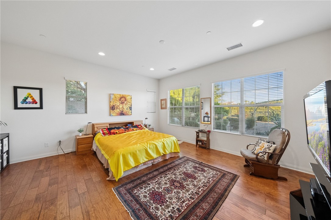 7774 Kingdom Drive Riverside, CA 92506 - Photo 28 of 66 a bed room with a bed and a couch