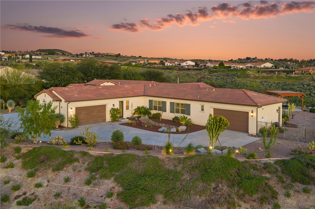 7774 Kingdom Drive Riverside, CA 92506 - Photo 4 of 66 an aerial view of a house with a yard