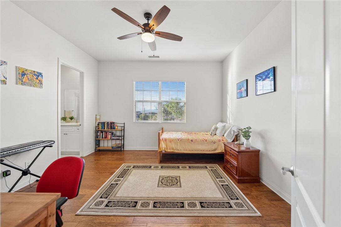 7774 Kingdom Drive Riverside, CA 92506 - Photo 44 of 66 a living room with furniture and a rug