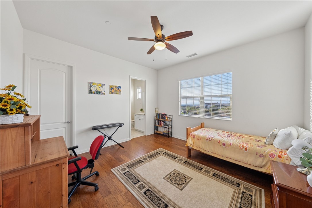 7774 Kingdom Drive Riverside, CA 92506 - Photo 45 of 66 a bed room with a bed and a window