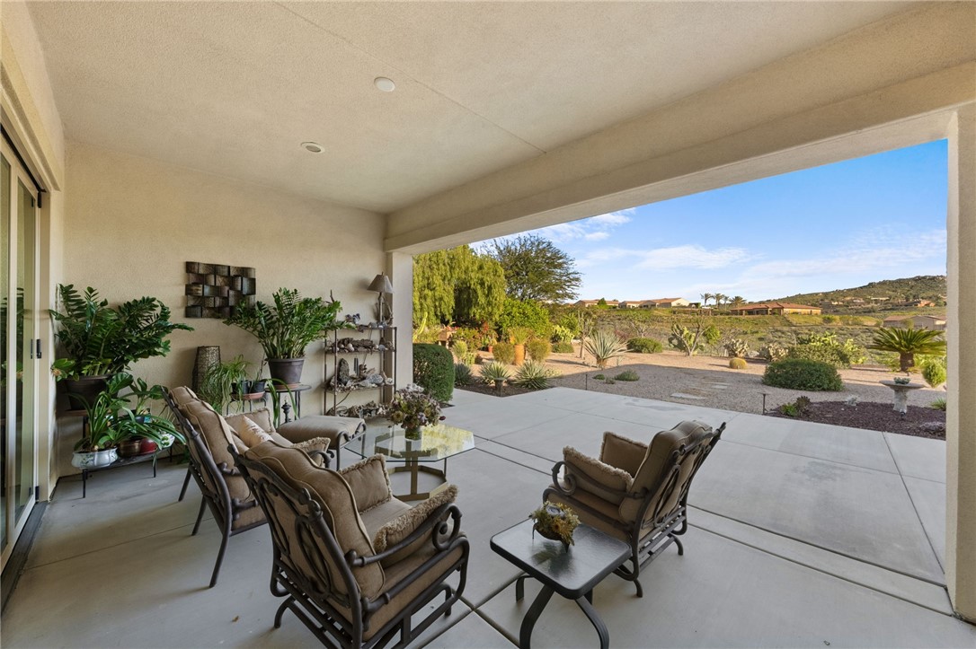 7774 Kingdom Drive Riverside, CA 92506 - Photo 47 of 66 a view of a chairs and table in patio