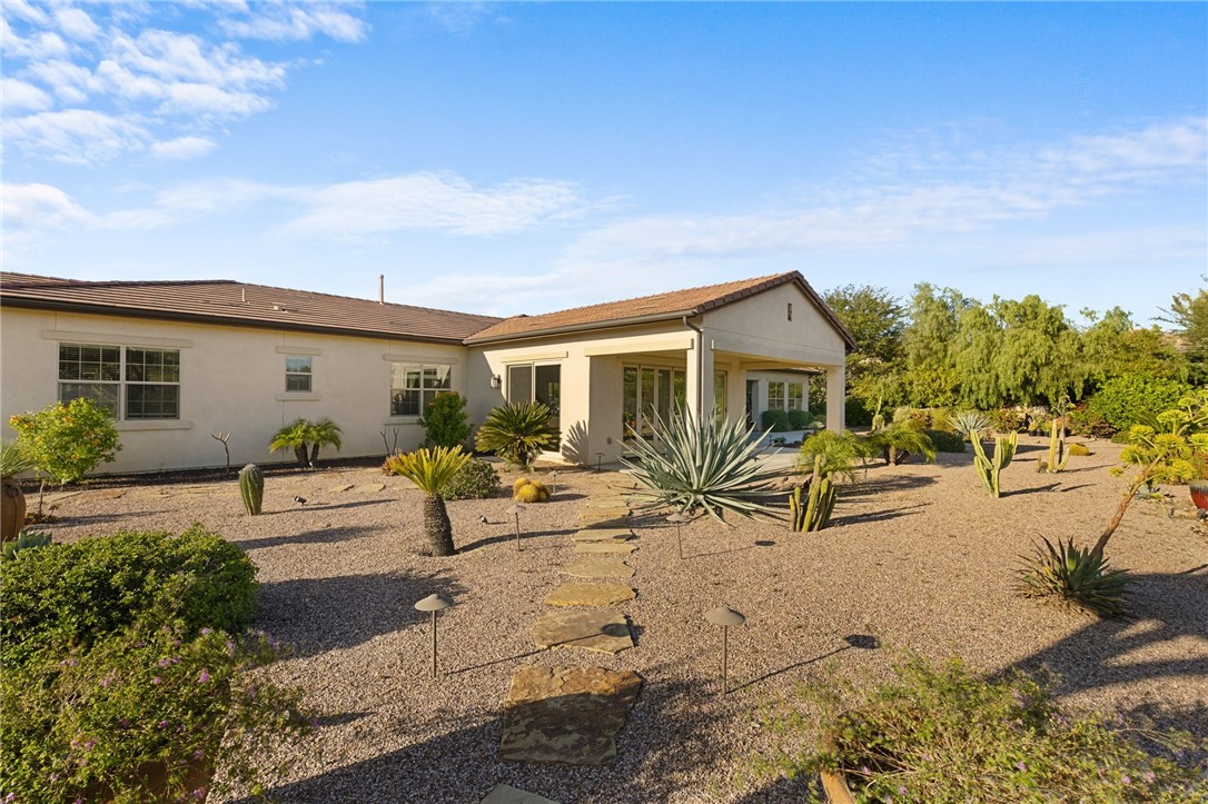 7774 Kingdom Drive Riverside, CA 92506 - Photo 57 of 66 a view of a house with backyard and sitting area
