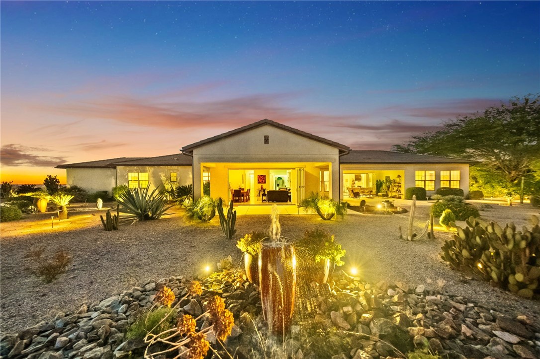 7774 Kingdom Drive Riverside, CA 92506 - Photo 60 of 66 a view of a swimming pool with an outdoor space and seating area