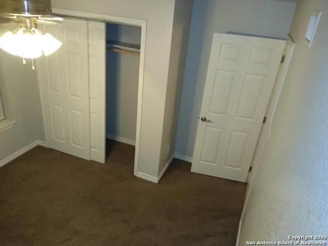 a view of a room with a mirror