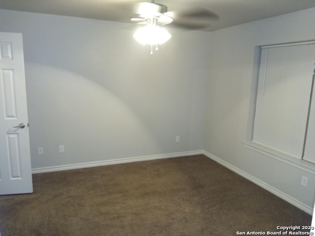 112 Lone Oak, Unit D102 Floresville, TX 78114 - Photo 20 of 34 an empty room with a empty space and a window