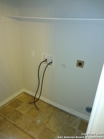 112 Lone Oak, Unit D102 Floresville, TX 78114 - Photo 32 of 34 a room with a shower