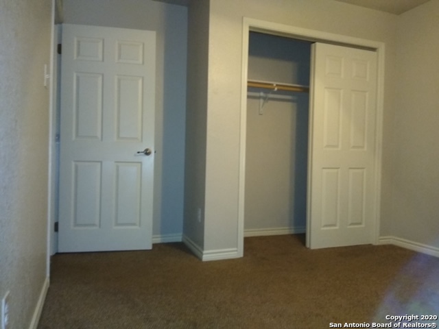 112 Lone Oak, Unit D102 Floresville, TX 78114 - Photo 33 of 34 a view of an empty room