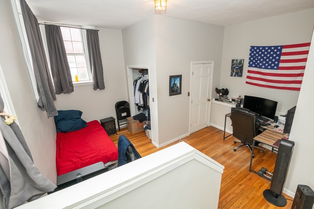 96 Derby Street, Unit 1 Salem, MA 01970 - Photo 17 of 31 a view of living room with furniture and a flat screen tv