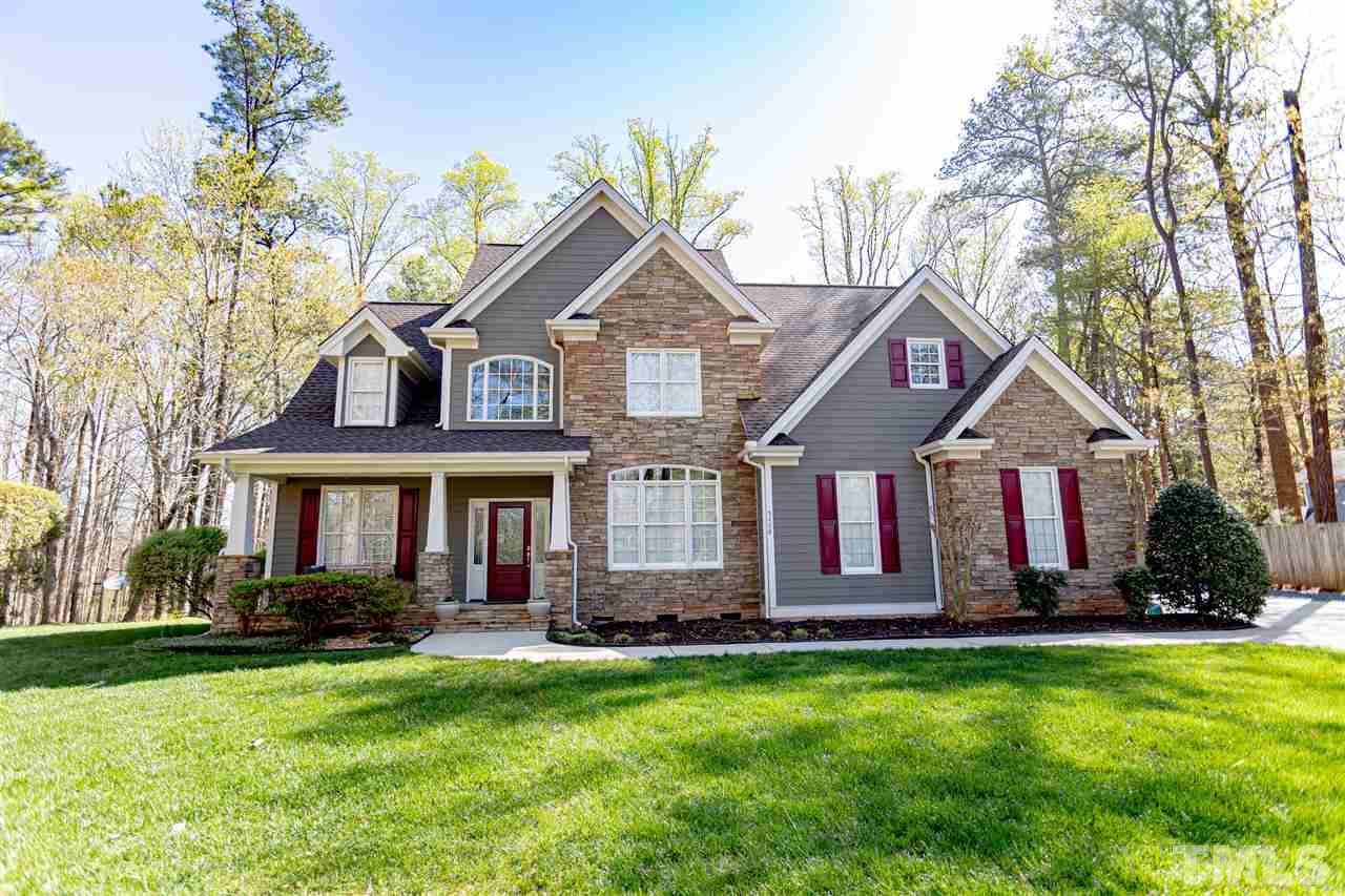 9408 Ray Road Raleigh, NC 27613 - Photo 1 of 30 a front view of house with yard and green space