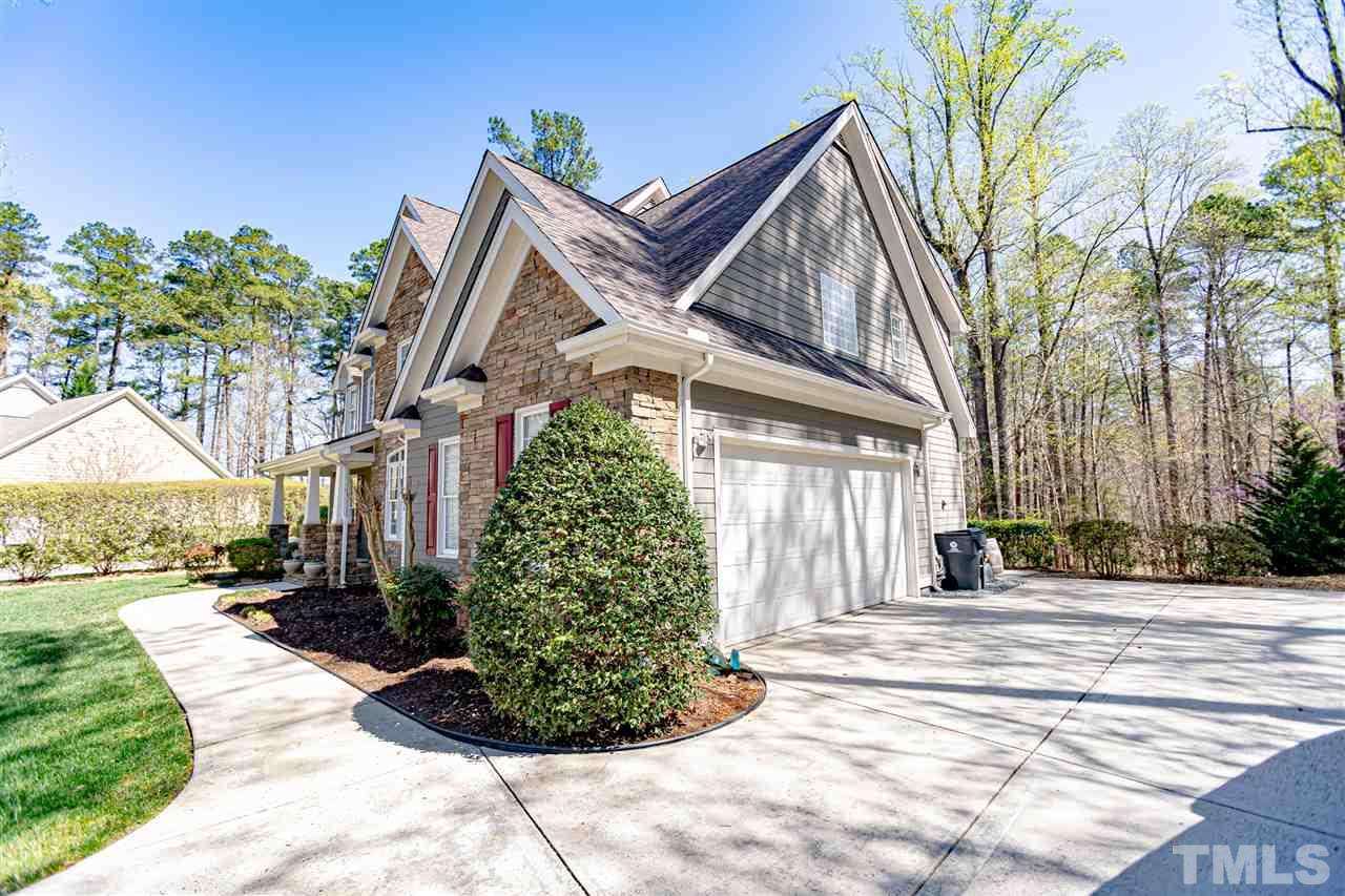 9408 Ray Road Raleigh, NC 27613 - Photo 2 of 30 a front view of a house with garden
