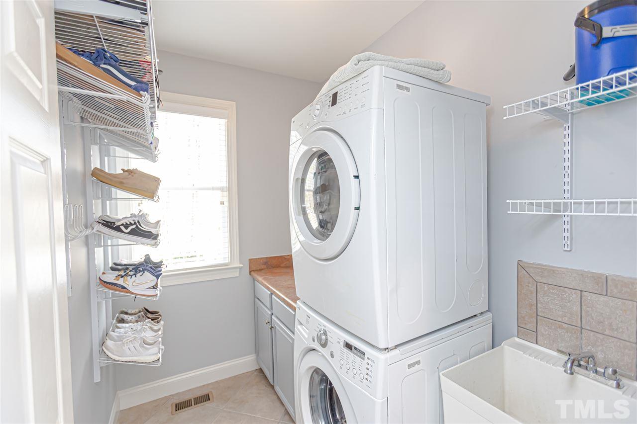 9408 Ray Road Raleigh, NC 27613 - Photo 26 of 30 a utility room with dryer and washer