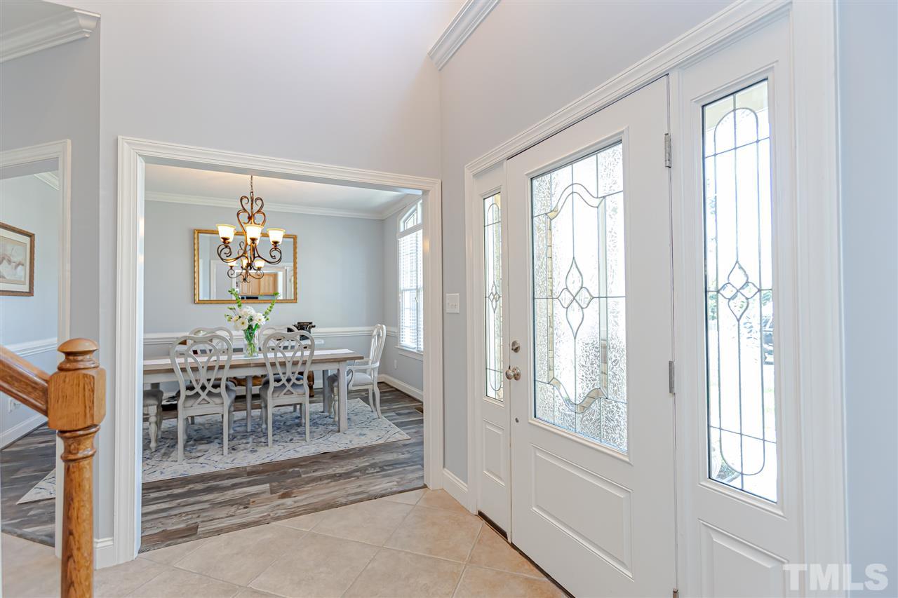 9408 Ray Road Raleigh, NC 27613 - Photo 4 of 30 a view of a livingroom with furniture and window