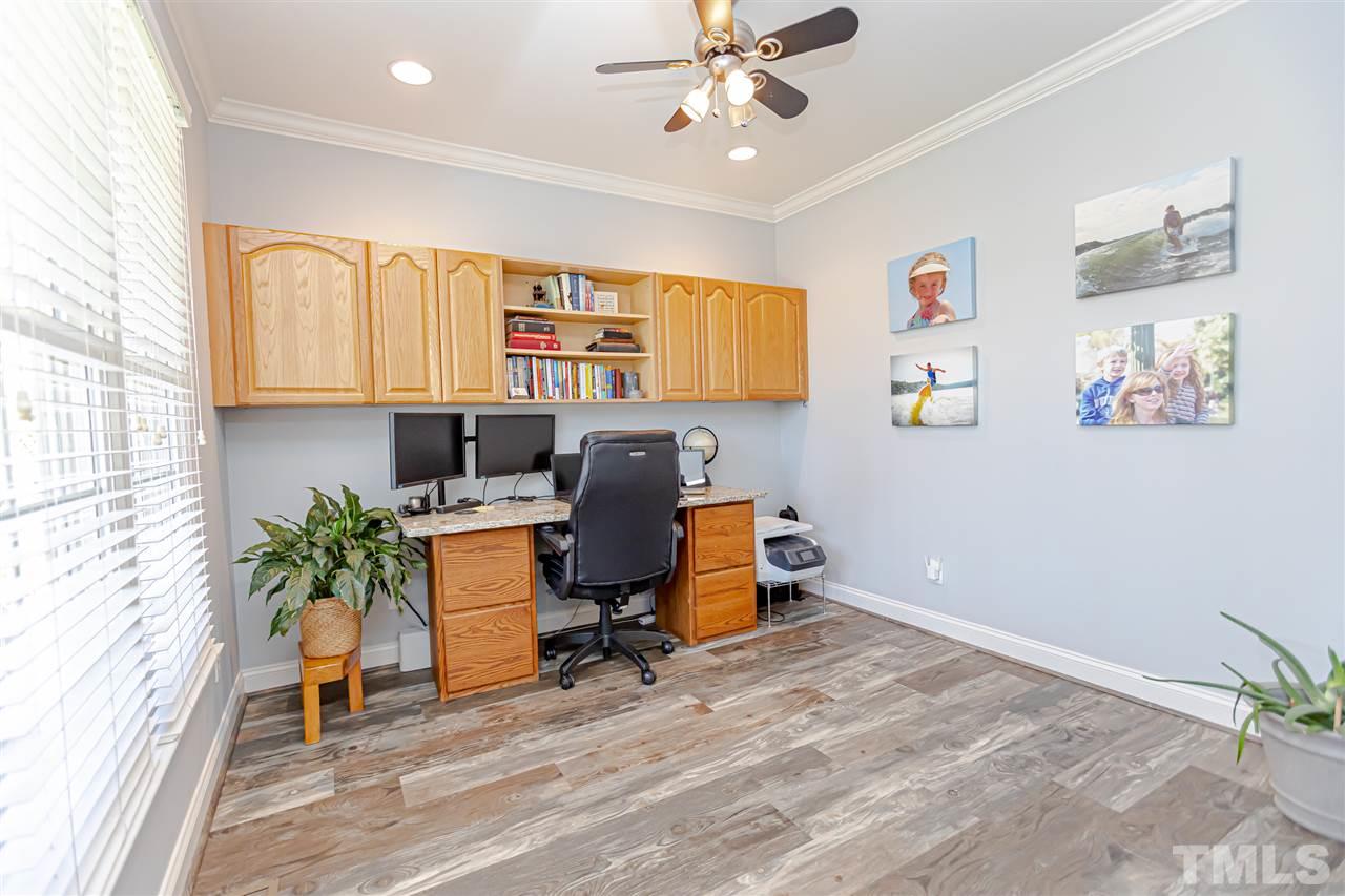 9408 Ray Road Raleigh, NC 27613 - Photo 7 of 30 a workspace with furniture and window