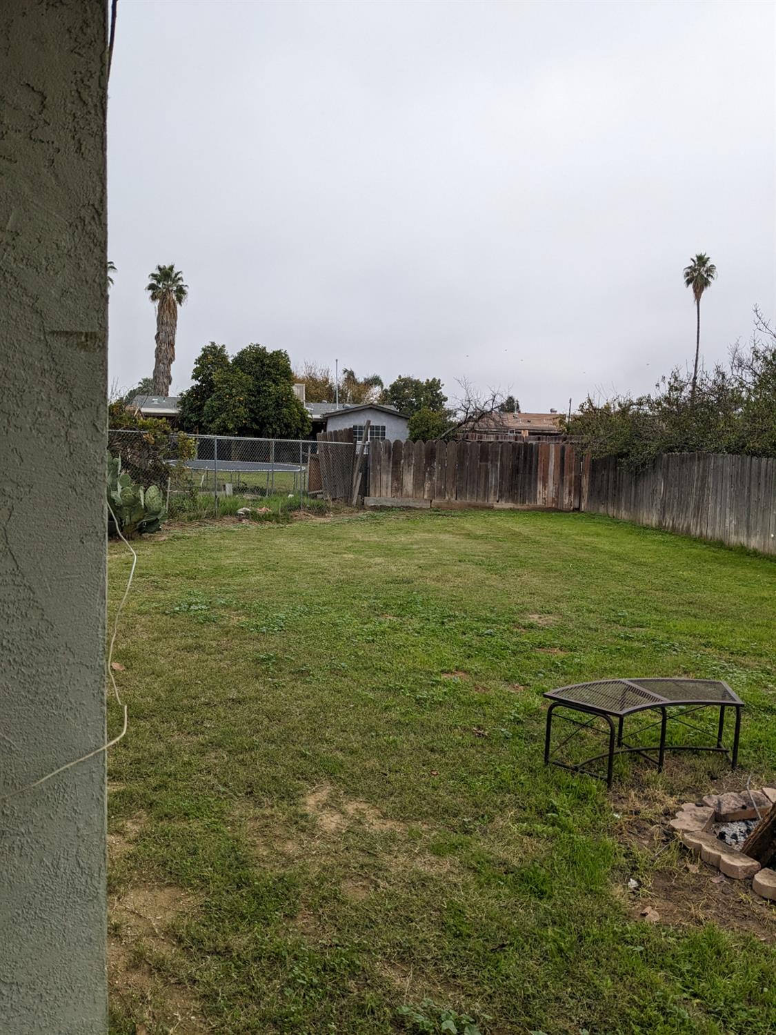 3607 Periwinkle Court Bakersfield, CA 93307 - Photo 13 of 13 a view of a lake with houses in back