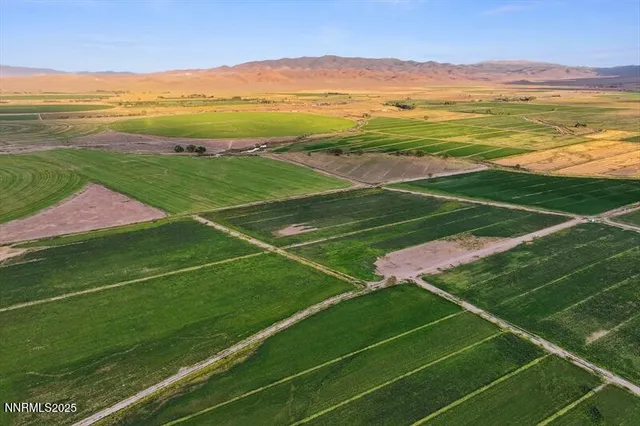 a view of an outdoor space and tennis court
