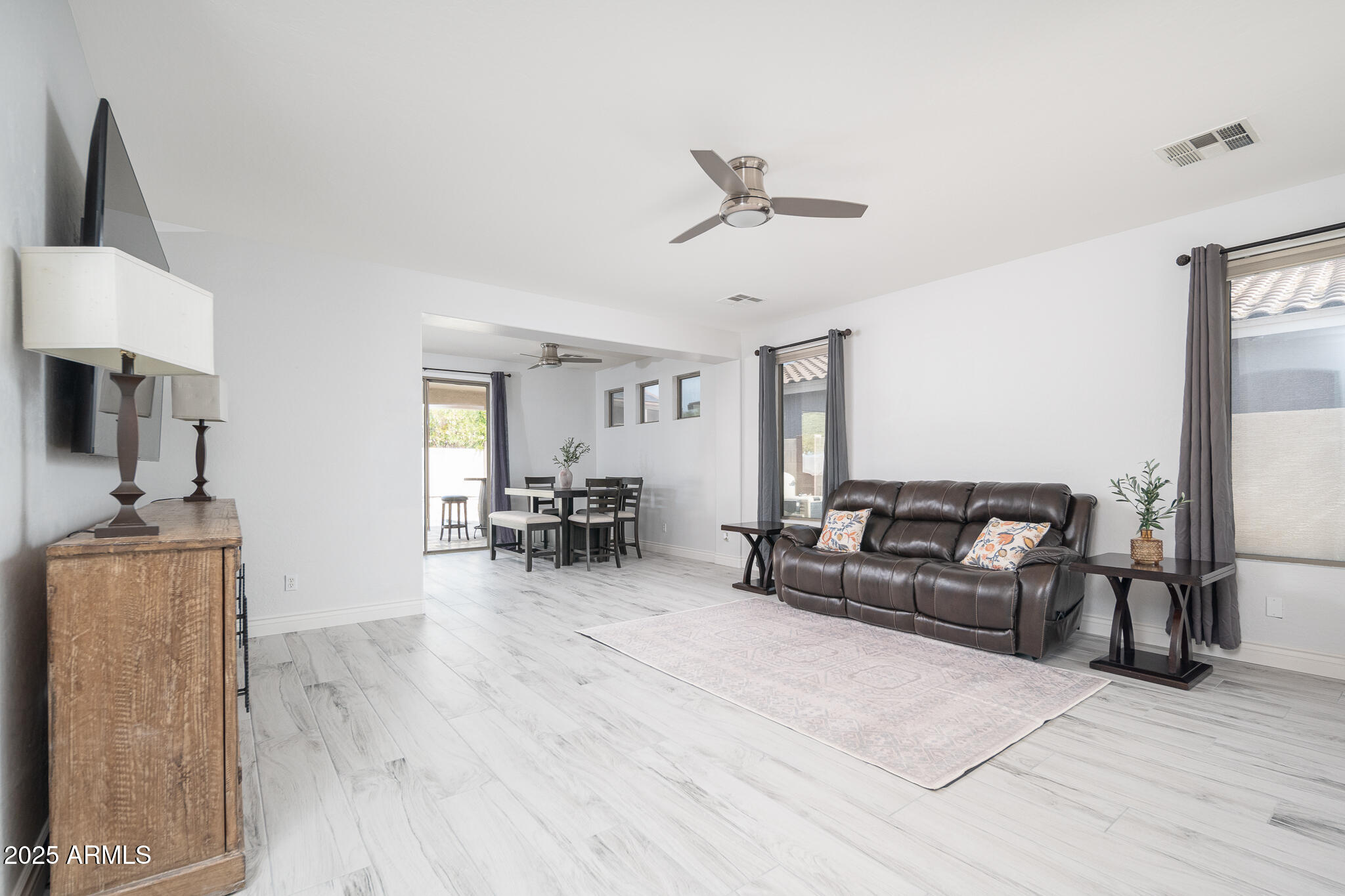 17560 West E Wind Avenue Goodyear, AZ 85338 - Photo 5 of 29 06_Living-Room_03