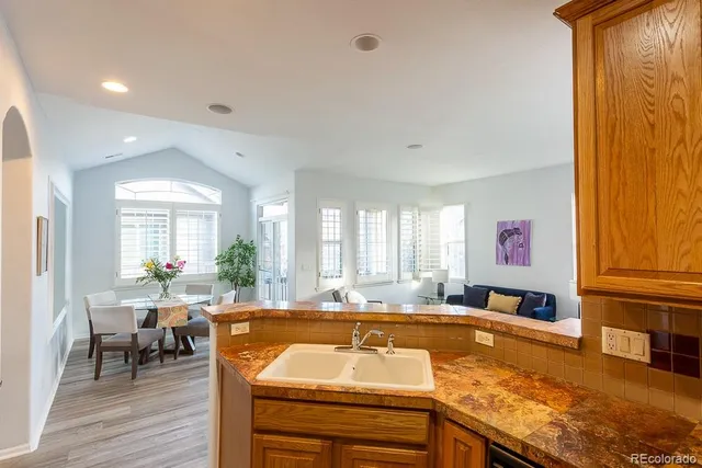 a view of a kitchen and dining room