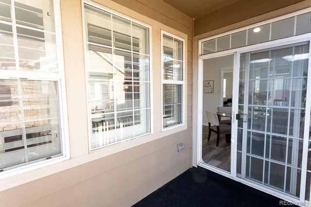 a view of empty room with windows