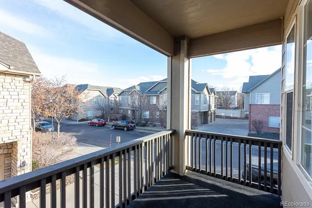 a view of a street from a balcony