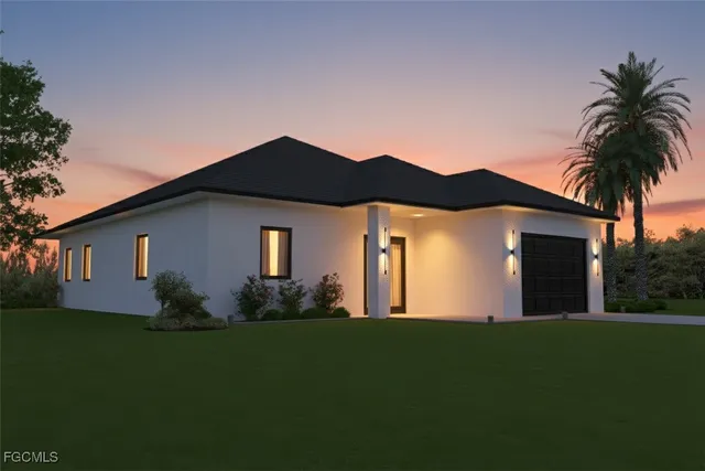 a front view of house with garden