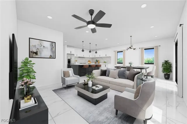 a living room with furniture and a large window