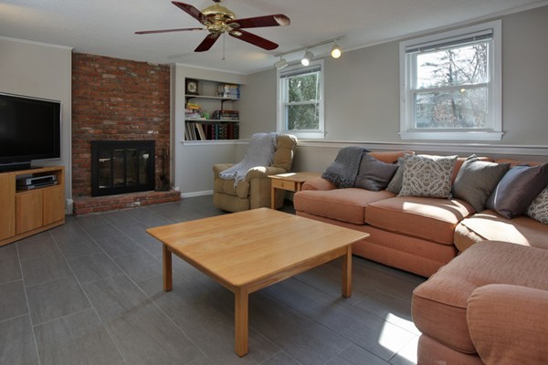 59 North Branch Road Concord, MA 01742 - Photo 8 of 10 a living room with furniture and a flat screen tv