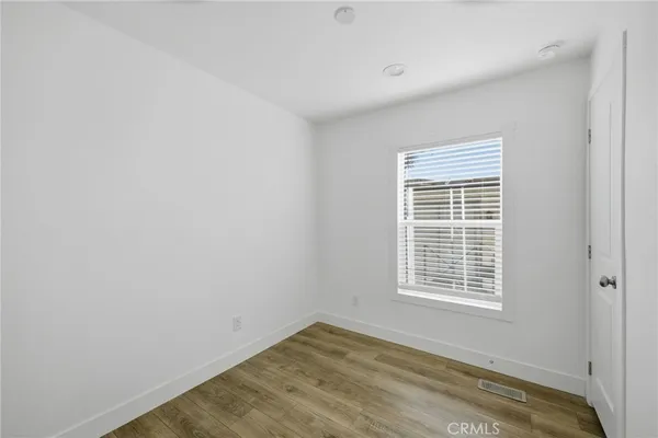 a view of a room with a window
