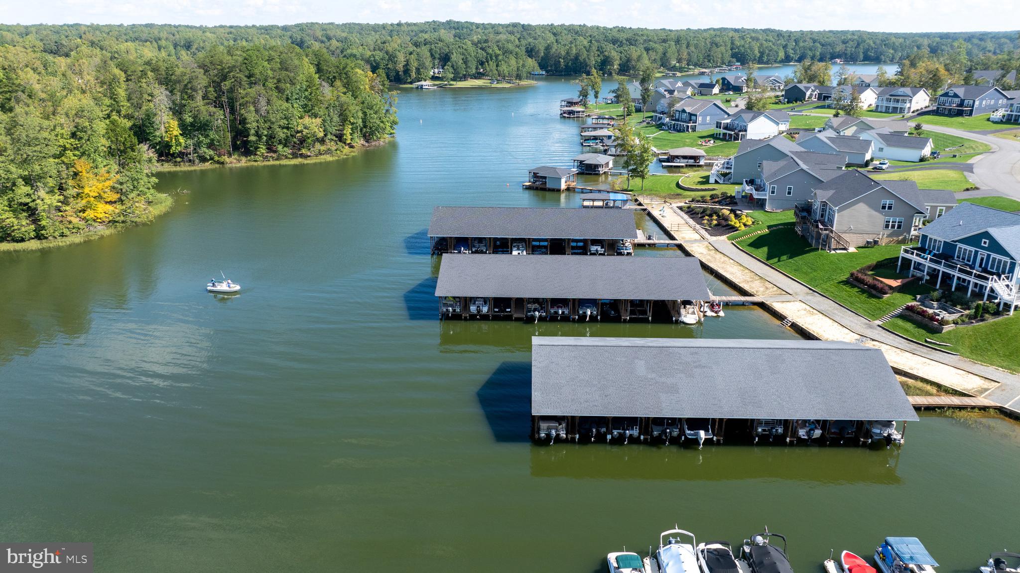 Lot 75 Sunset Loop Mineral, VA 23117 - Photo 2 of 9 an aerial view of a house with a swimming pool