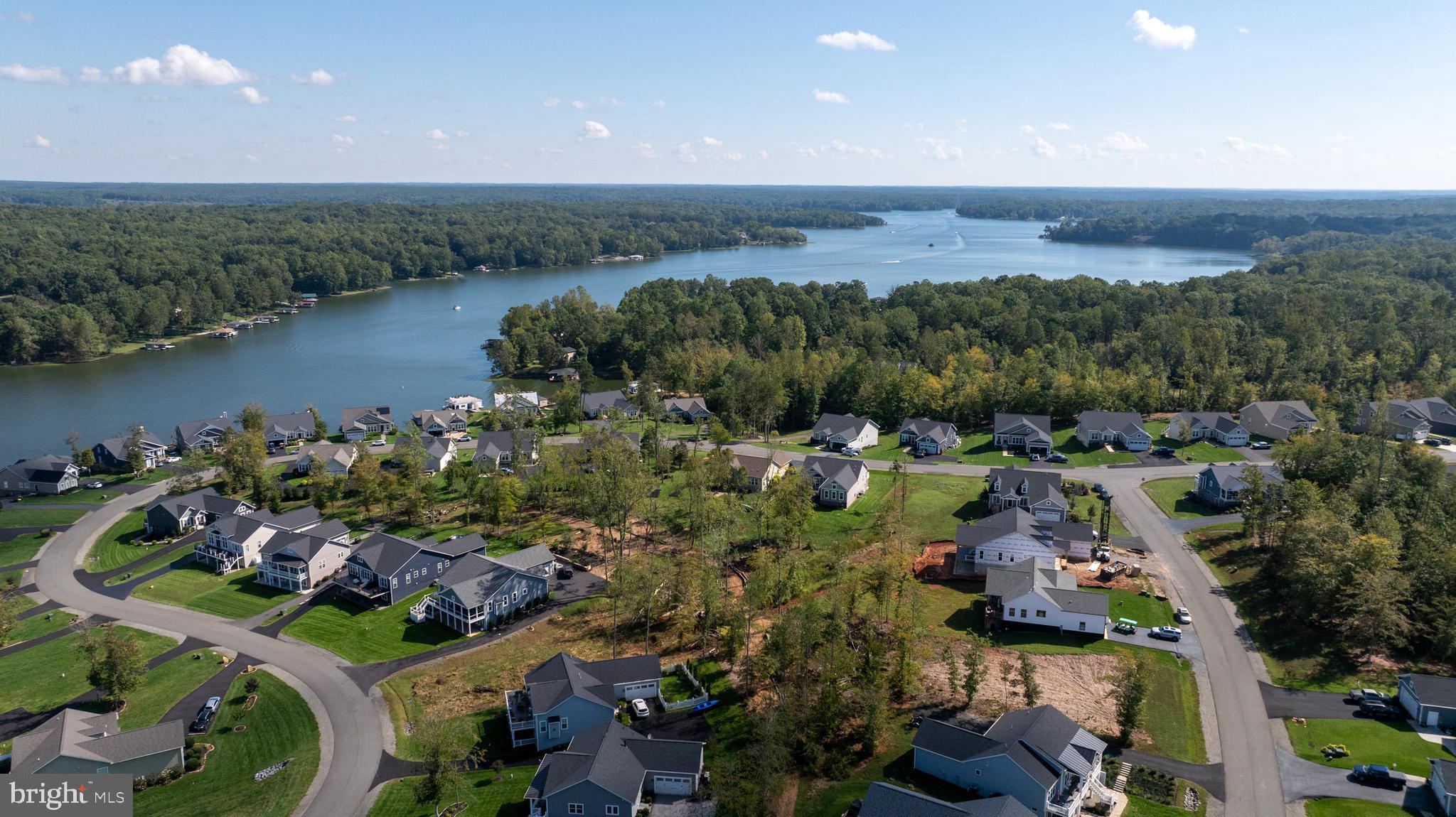 Lot 75 Sunset Loop Mineral, VA 23117 - Photo 3 of 9 an aerial view of a houses with a lake view