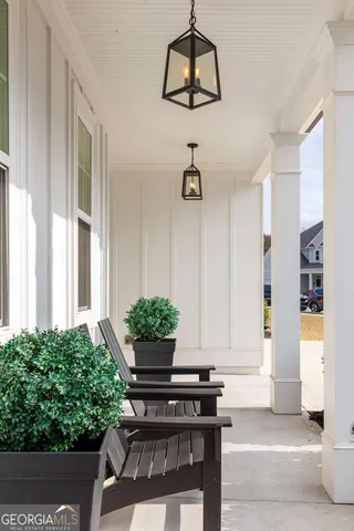 a view of a livingroom with furniture and front door