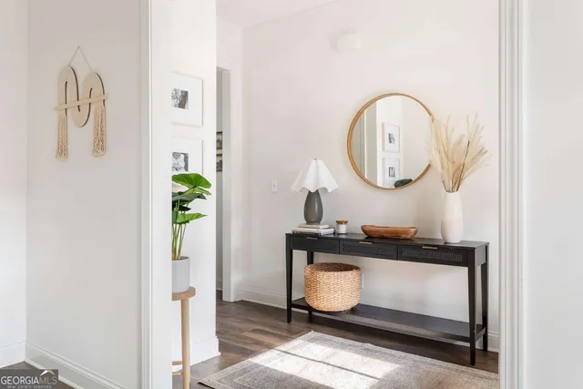 a bathroom with a sink a vanity and a mirror