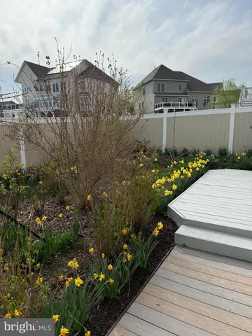 a view of an empty room and a window