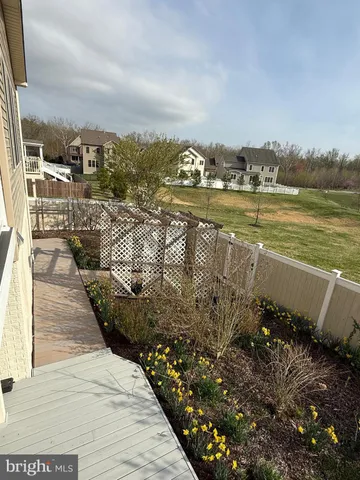 a view of empty room with windows