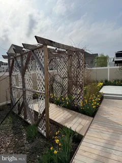 a view of a room with workspace and a couch