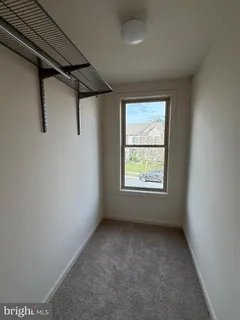 a bathroom with a toilet and a bathtub