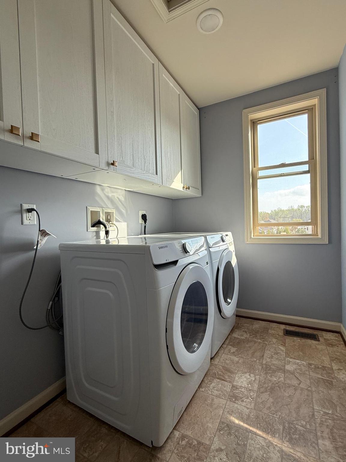 1108 Autumn Brook Avenue Silver Spring, MD 20906 - Photo 30 of 68 a utility room with dryer and washer
