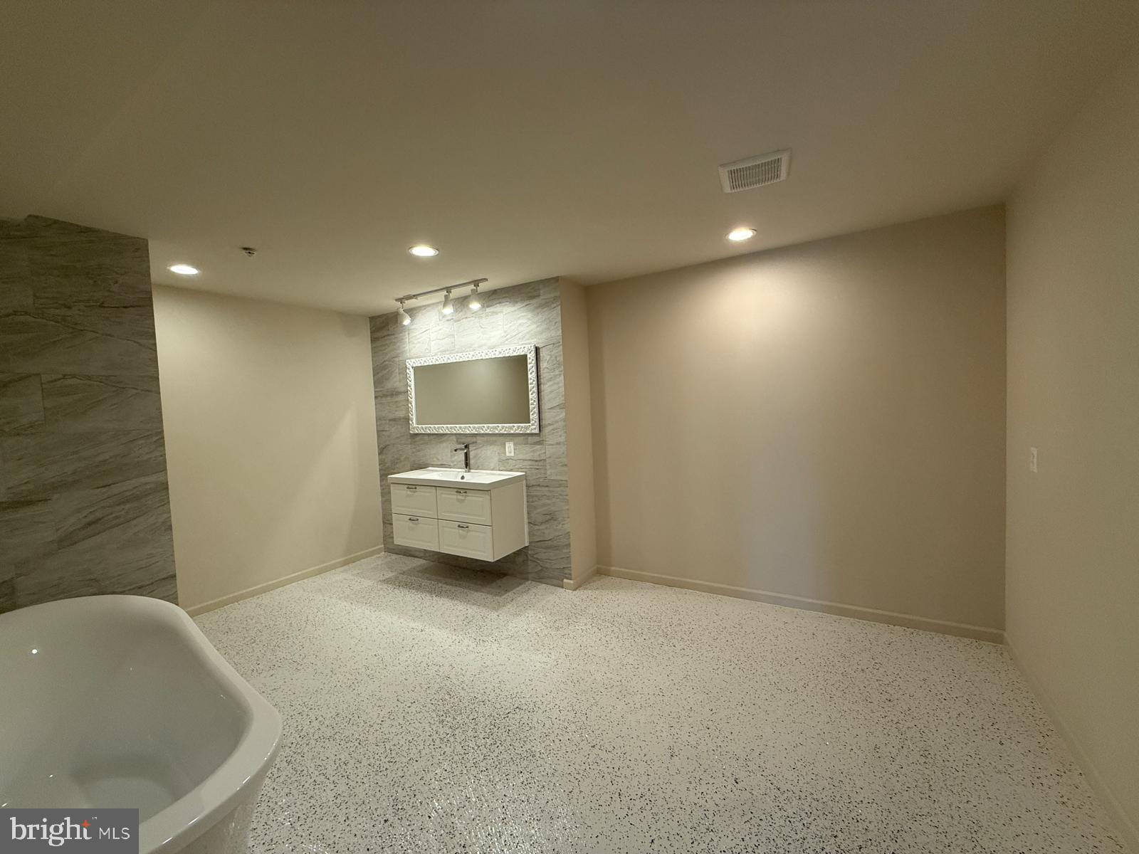 1108 Autumn Brook Avenue Silver Spring, MD 20906 - Photo 31 of 68 a view of a room with workspace and a couch