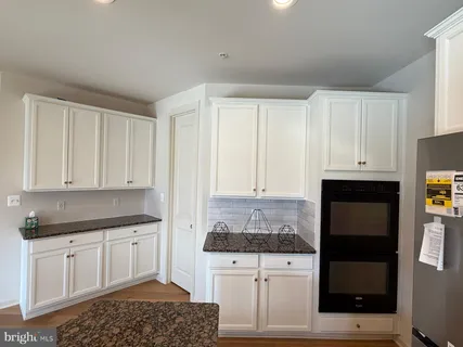 a view of a kitchen with a sink