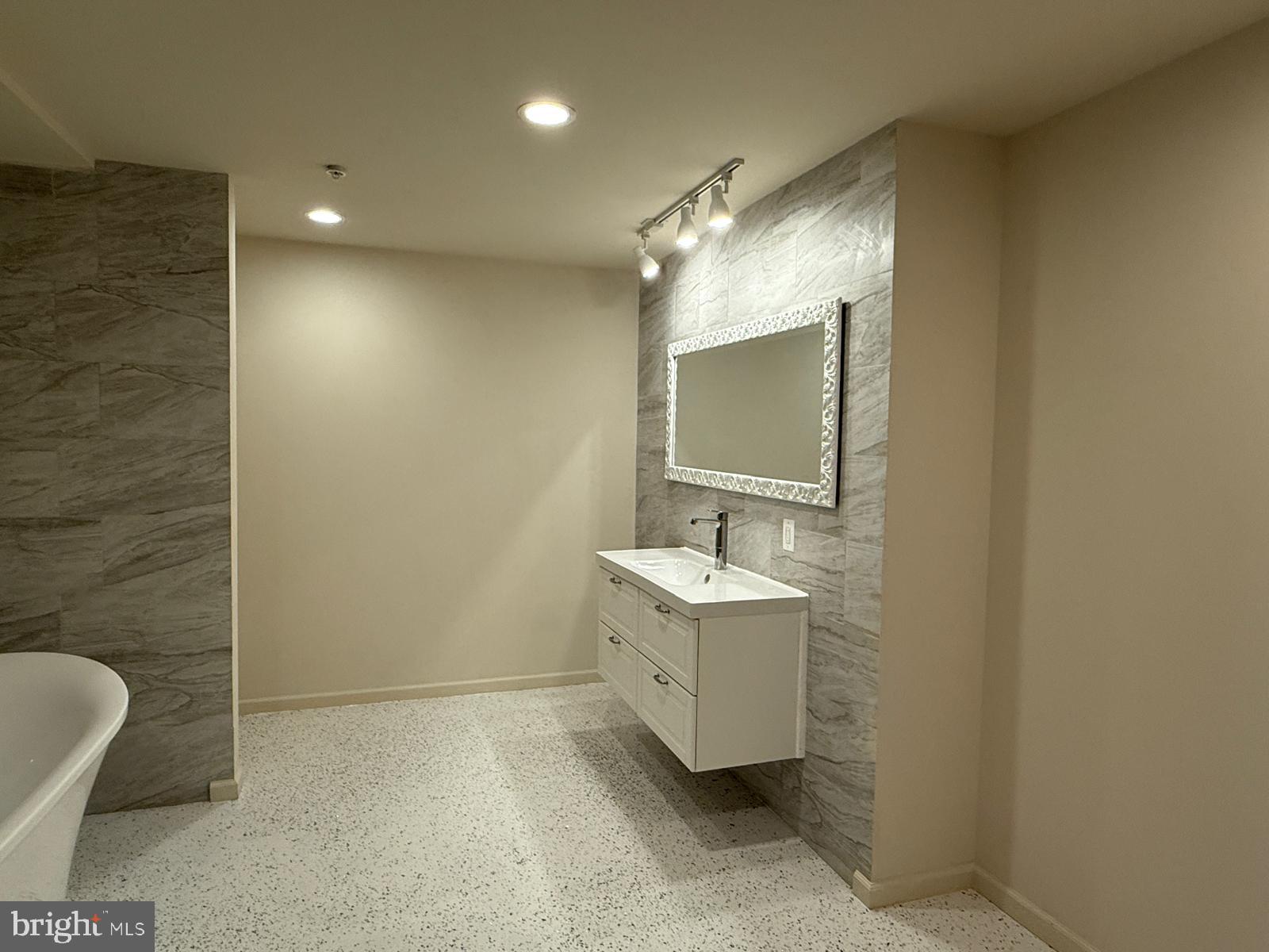 1108 Autumn Brook Avenue Silver Spring, MD 20906 - Photo 35 of 68 a bathroom with a double vanity sink mirror and bathtub