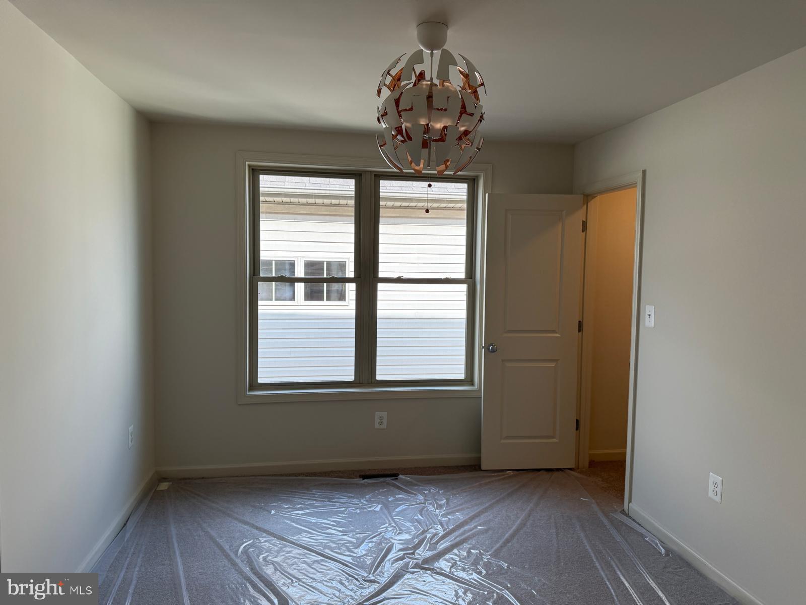 1108 Autumn Brook Avenue Silver Spring, MD 20906 - Photo 43 of 68 a view of an empty room with a window
