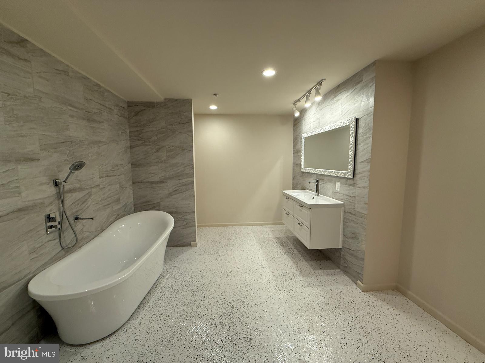 1108 Autumn Brook Avenue Silver Spring, MD 20906 - Photo 62 of 68 a bathroom with a sink a toilet and bathtub